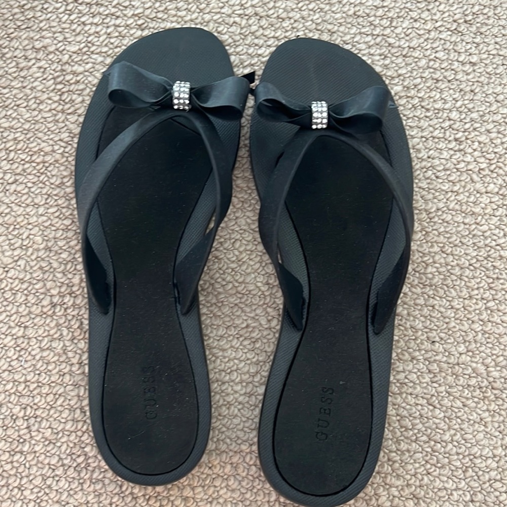 Guess bow tie flip flops